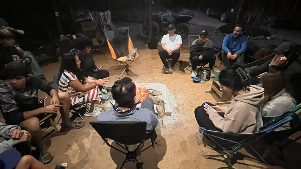 Safe and supportive Circle of Word ceremony gathered around the sacred fire at Camino al Sol